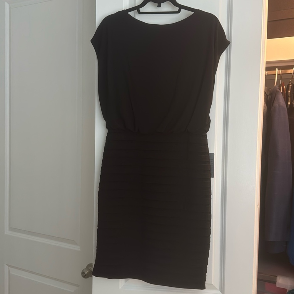 Black cocktail dress before, never worn before